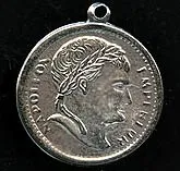 b9-0739-Vintage silver metal Napoleon coin charm. 23mm Pkg. of 4