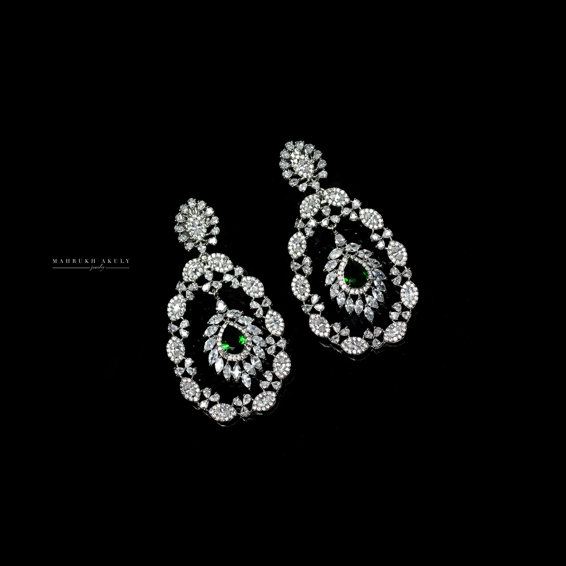 Emerald and zirconia earrings